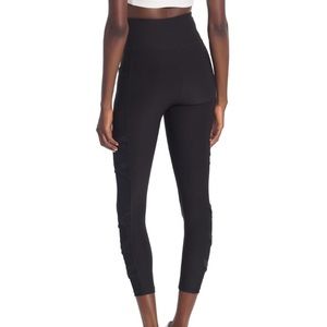 EUC criss cross mesh x by gottex black leggings